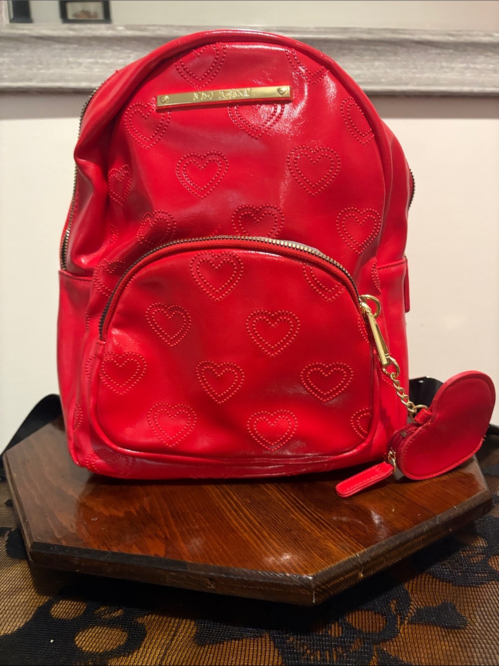 Red Heart-Embossed Women’s Backpack with Gold Accent